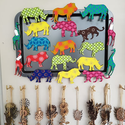 Dana Dreyer - Functional and decorative objects using a mixture of laser cut wood and shweshwe fabrics