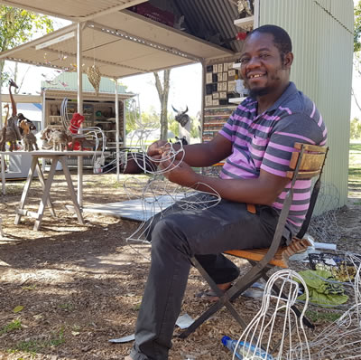 Gora Dambuleni with his animal sculptures and trophy heads