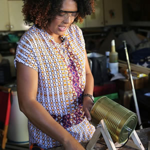 Lizl – Lilly Loompa – with her décor items and ‘toona’ cans made from recycled materials